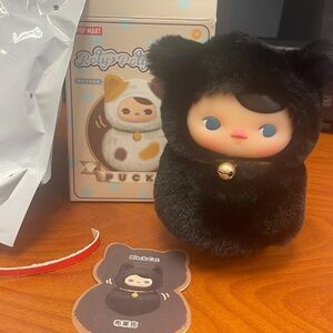 Popmart authentic Roly Poly Black pucky plush.